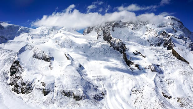 snow mountains with clouds, zermatt, switzerland