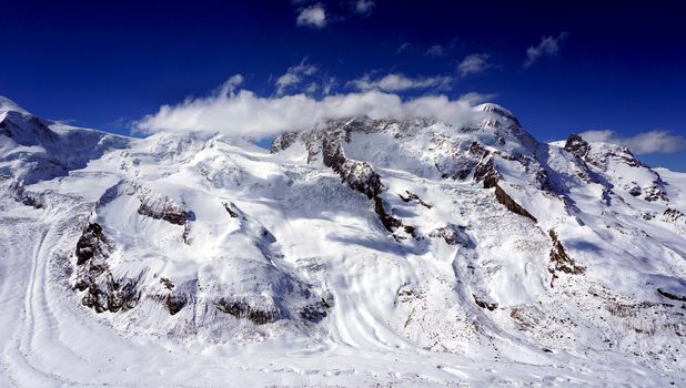 snow alps mountains scene and blue sky, zermatt, switzerland