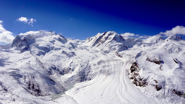 snow alps mountains view and blue sky, zermatt, switzerland