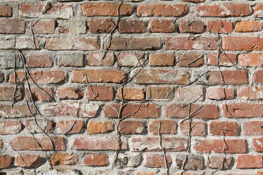 Background, old masonry brick wall in Winterswijk in the Netherlands
