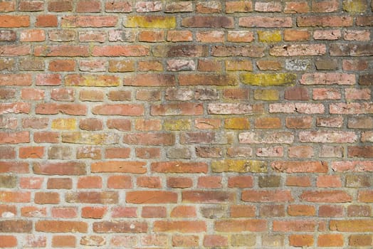 Background, old masonry brick wall in Winterswijk in the Netherlands
