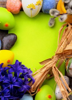 Easter Greeting Card with Pussy-Willow, Colored Stones, Crocus, Easter Eggs and Empty Green Place to Congratulations