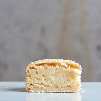 Sweet handmade macaroon on grey background. Shallow dof