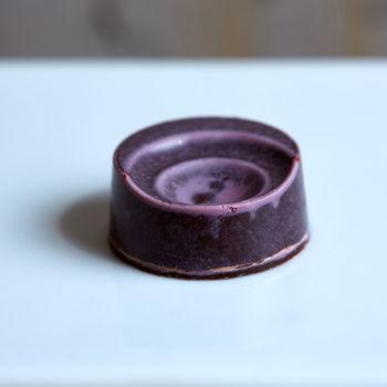 The handmade chocolate sweet. Shallow dof. Closeup