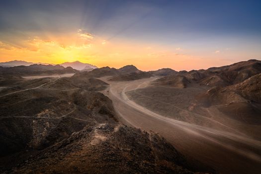 In the picture the Egyptian desert rocks at sunset.