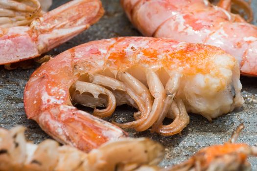 In the picture of cooked shrimp close-up to the plate.