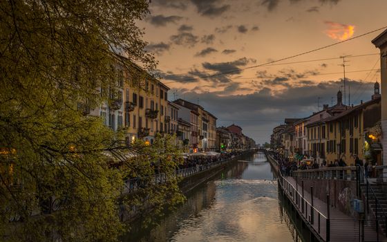 Pictured the canals in Milan "Navigli milanesi" where thousands of people every night they go for a drink or a simple walk .