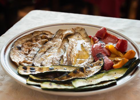 Pictured mix grilled zucchini,pepper and eggplant with spice and oil.