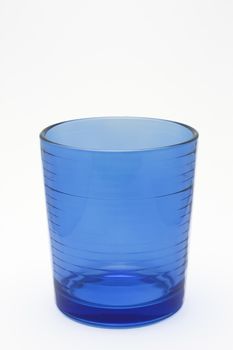 Blue glass isolated on white background