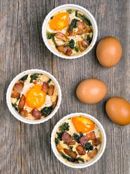 close up of rustic baked potted egg