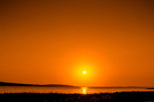 Beautiful sunrise over a lake in the morning