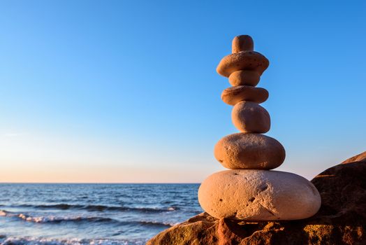 Pyramidal group of stones on the coast