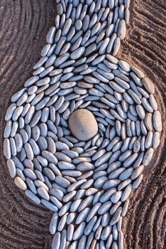 Zen meditation of rock garden concept. Balance of sand and pebbles
