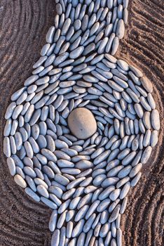 Zen meditation of rock garden concept. Balance of sand and pebbles