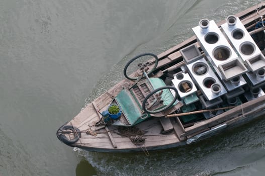 Cargo boat floating on the Mekong river, southern Vietnam.