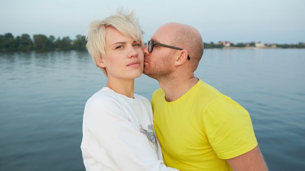 Husband and wife on a yacht on the Dnieper River