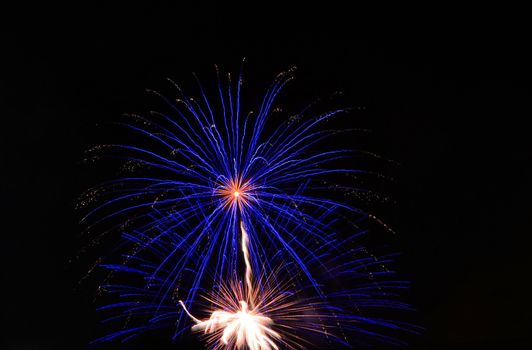 fireworks lighting the night sky in different colors