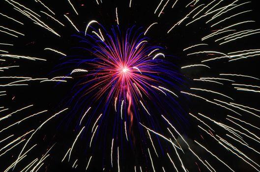 fireworks lighting the night sky in different colors