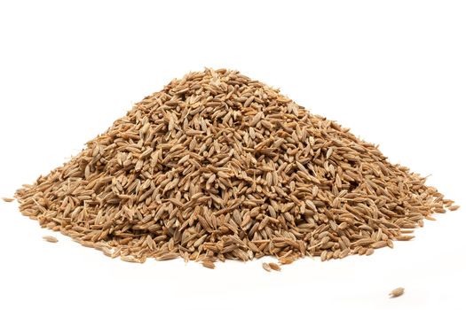 Pile of Organic Cumin seed (Cuminum cyminum) isolated on white background.