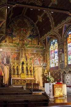 Bruges, Belgium - May 11, 2015: Interior of Basilica of the Holy Blood in Bruges, Belgium on May 11, 2015. Basilica is located in the Burg square and consists of a lower and upper chapel. 