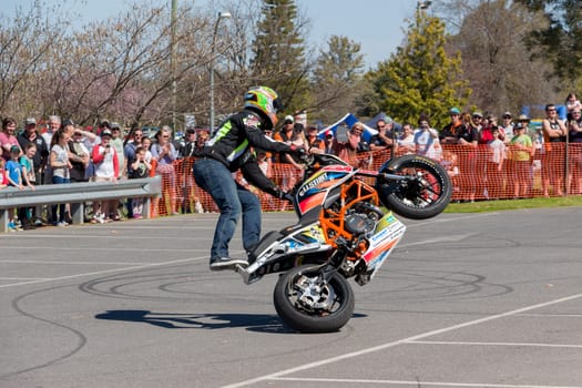 VICTORIA/AUSTRALIA - SEPTEMBER 2015: Stunt motorcycle rider performing at a local car show on the 13 September 2015 in Corowa.