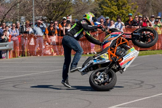 VICTORIA/AUSTRALIA - SEPTEMBER 2015: Stunt motorcycle rider performing at a local car show on the 13 September 2015 in Corowa.