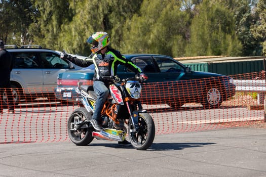 VICTORIA/AUSTRALIA - SEPTEMBER 2015: Stunt motorcycle rider performing at a local car show on the 13 September 2015 in Corowa.