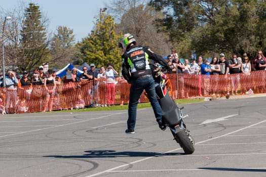 VICTORIA/AUSTRALIA - SEPTEMBER 2015: Stunt motorcycle rider performing at a local car show on the 13 September 2015 in Corowa.