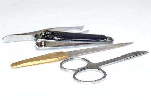 metal manicure set ( scissors, nail file, tweezers )