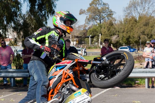 VICTORIA/AUSTRALIA - SEPTEMBER 2015: Stunt motorcycle rider performing at a local car show on the 13 September 2015 in Corowa.