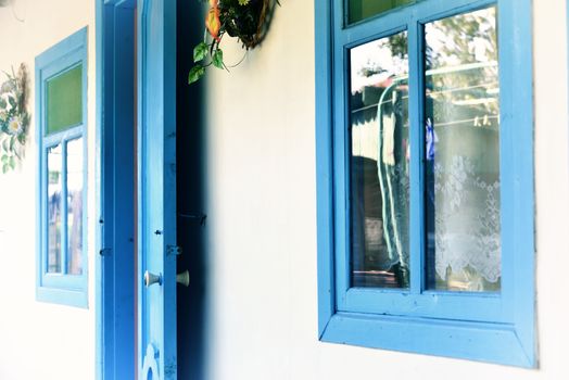 old blue doors and windows (hotel rooms)