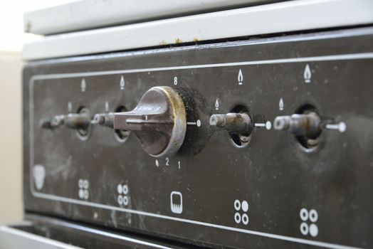 old gas stove with one handle