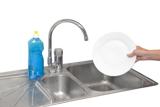 hands dishwashing plates with blue cleaner 