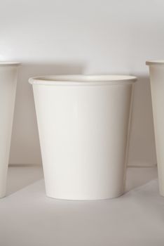 three  disposable paper cup for coffe or ice cream
