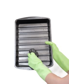 cleaning dripping pan with scraper