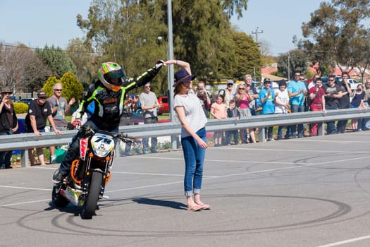 VICTORIA/AUSTRALIA - SEPTEMBER 2015: Stunt motorcycle rider performing at a local car show on the 13 September 2015 in Corowa.