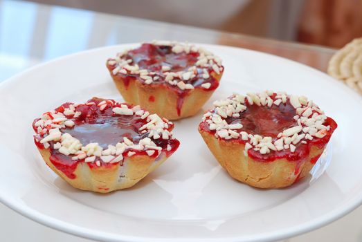 tree shaped cherry cake on white plate