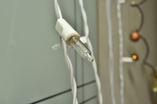 macro zoomed diode lamp on white wire 