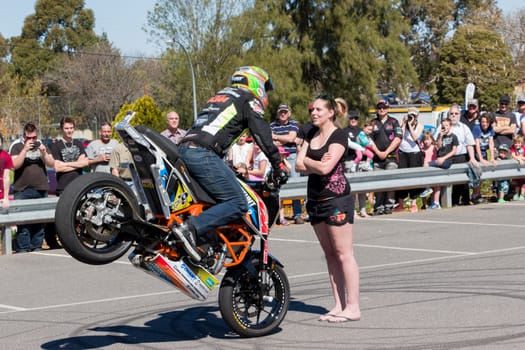 VICTORIA/AUSTRALIA - SEPTEMBER 2015: Stunt motorcycle rider performing at a local car show on the 13 September 2015 in Corowa.