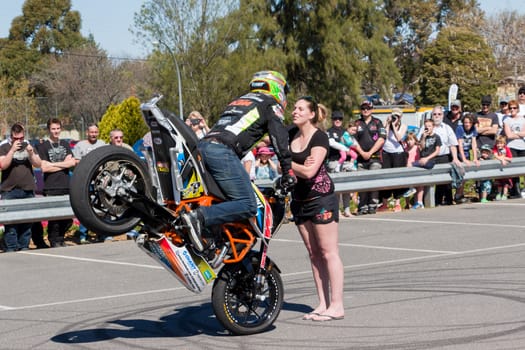 VICTORIA/AUSTRALIA - SEPTEMBER 2015: Stunt motorcycle rider performing at a local car show on the 13 September 2015 in Corowa.