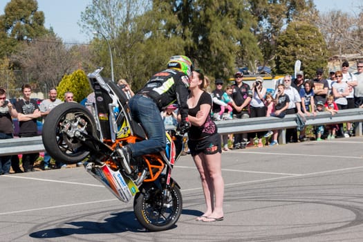 VICTORIA/AUSTRALIA - SEPTEMBER 2015: Stunt motorcycle rider performing at a local car show on the 13 September 2015 in Corowa.