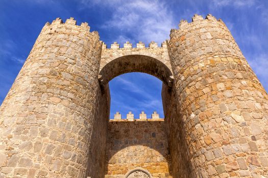 Castle Town Walls Arch Gate Avila Castile Spain.  Described as the most 16th century town in Spain. Public walls, not private.   Walls created in 1088 after Christians conquer and take the city from the Moors  