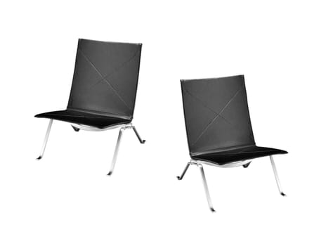Shiny metal and black leather bar stools, isolated on white