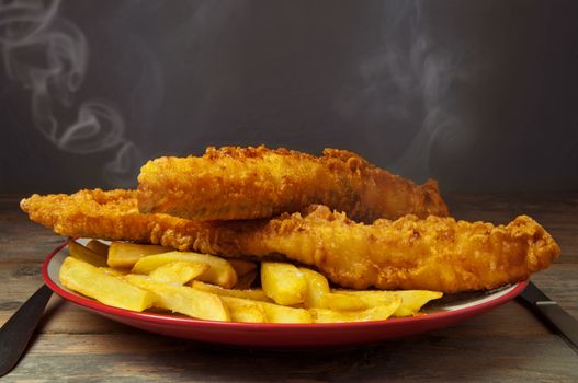 Hot plate of traditional fish and chips