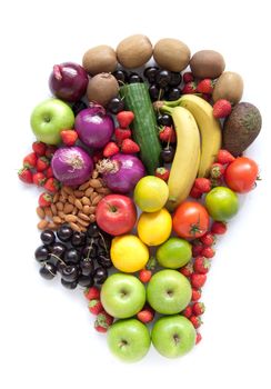 Healthy food ingredients including fruits and vegetables in the shape of a human profile over a white background
