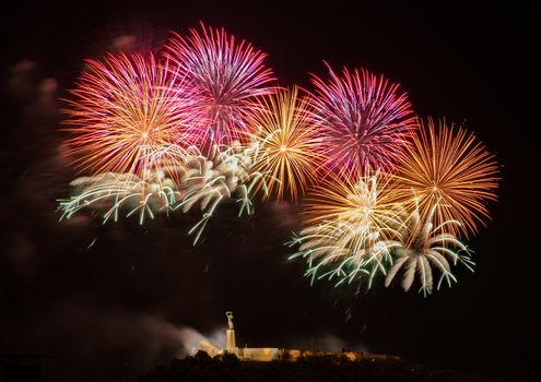 Fireworks over Liberty statue in Budapest, Hungary