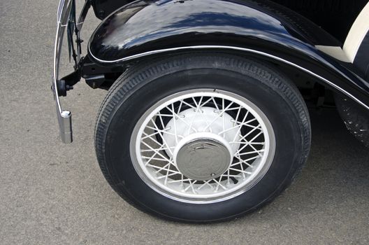 beautiful wheel of black antique car