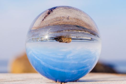 Seashore is reflected in the crystal ball