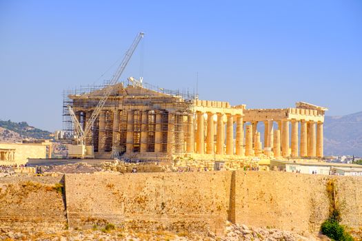 Scenic view of ancient Pantheon temple in Acropolis under construction, Athens, Greece