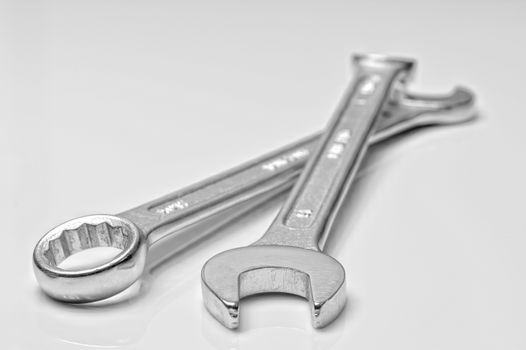 Socket wrench isolated on white with shadow.